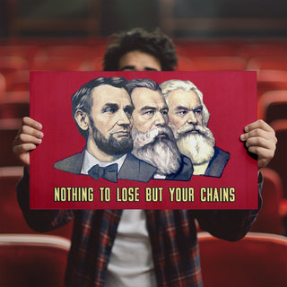 A mockup of a man holding an alt-history propaganda poster in a movie theatre. The artwork, inspired by communist posters, depicts Lincoln alongside Marx and Engels as founders of the socialist ideology.